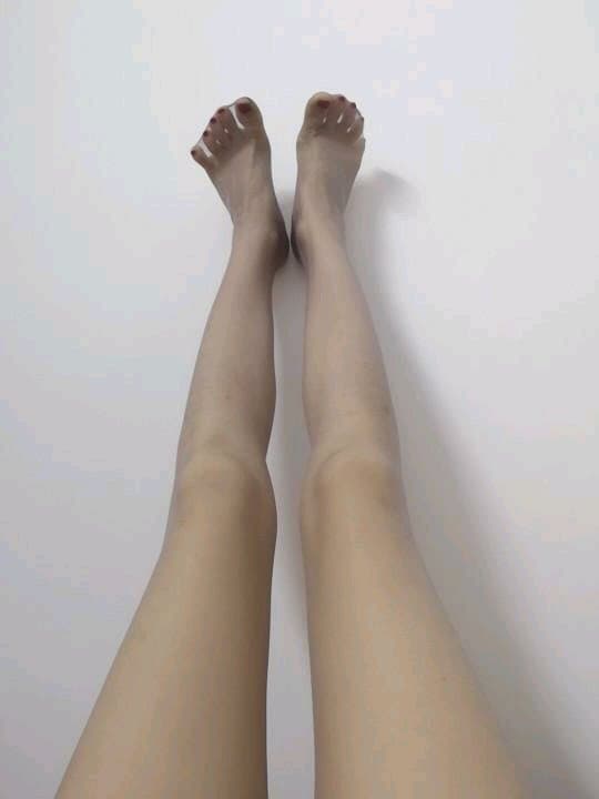 hand holding a folded sock