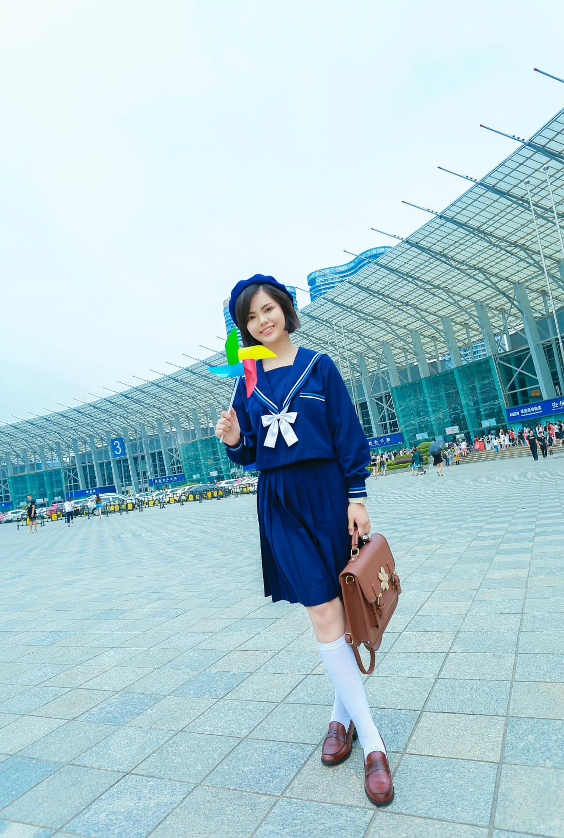 Pale foot encased in shimmering silver nylon stocking with highlighted toes and delicate ankle curve