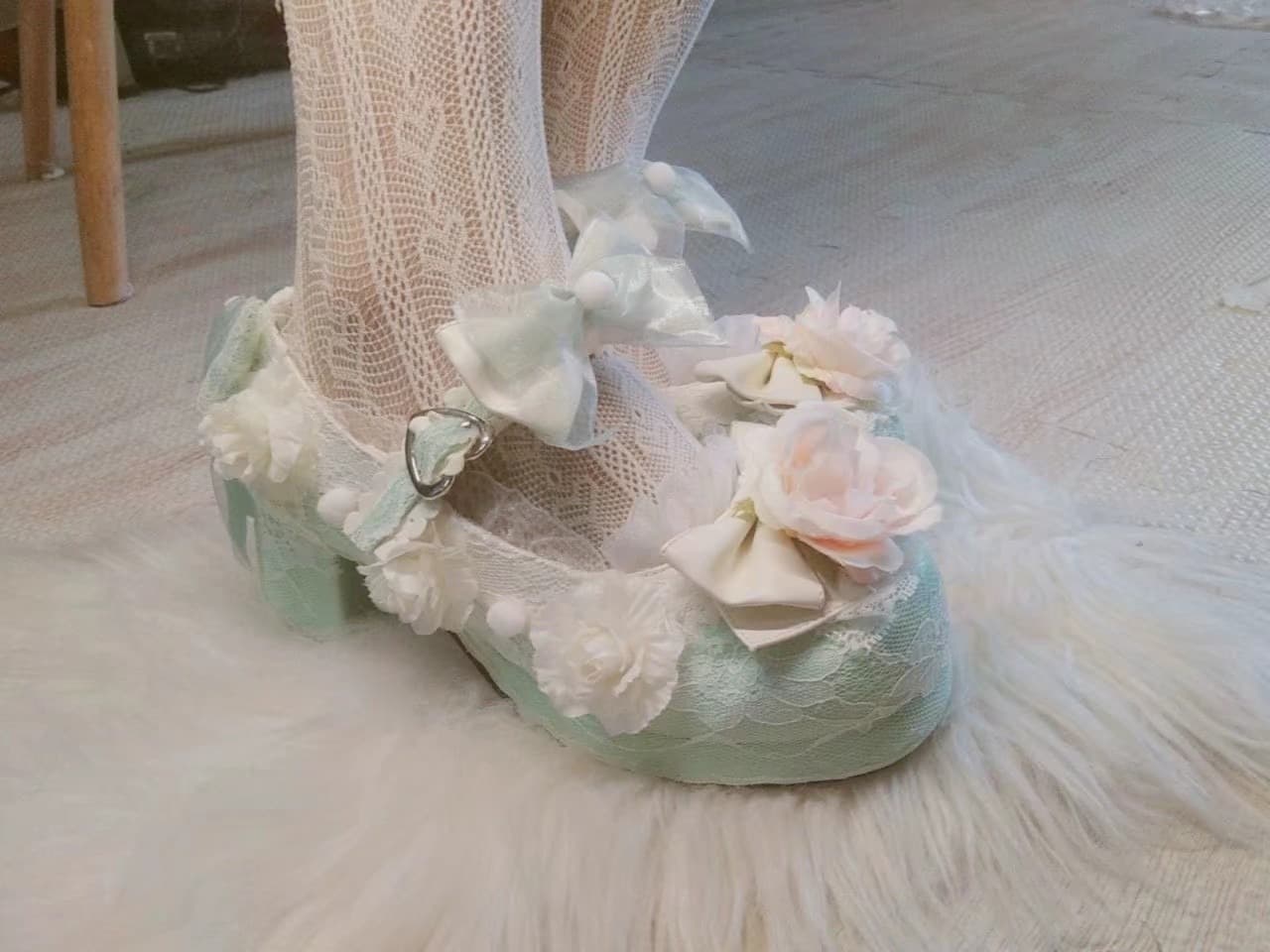 Close-up of feet peeking from beneath hanfu robes, sheer stocking edge and silk texture creating a delicate, suggestive scene