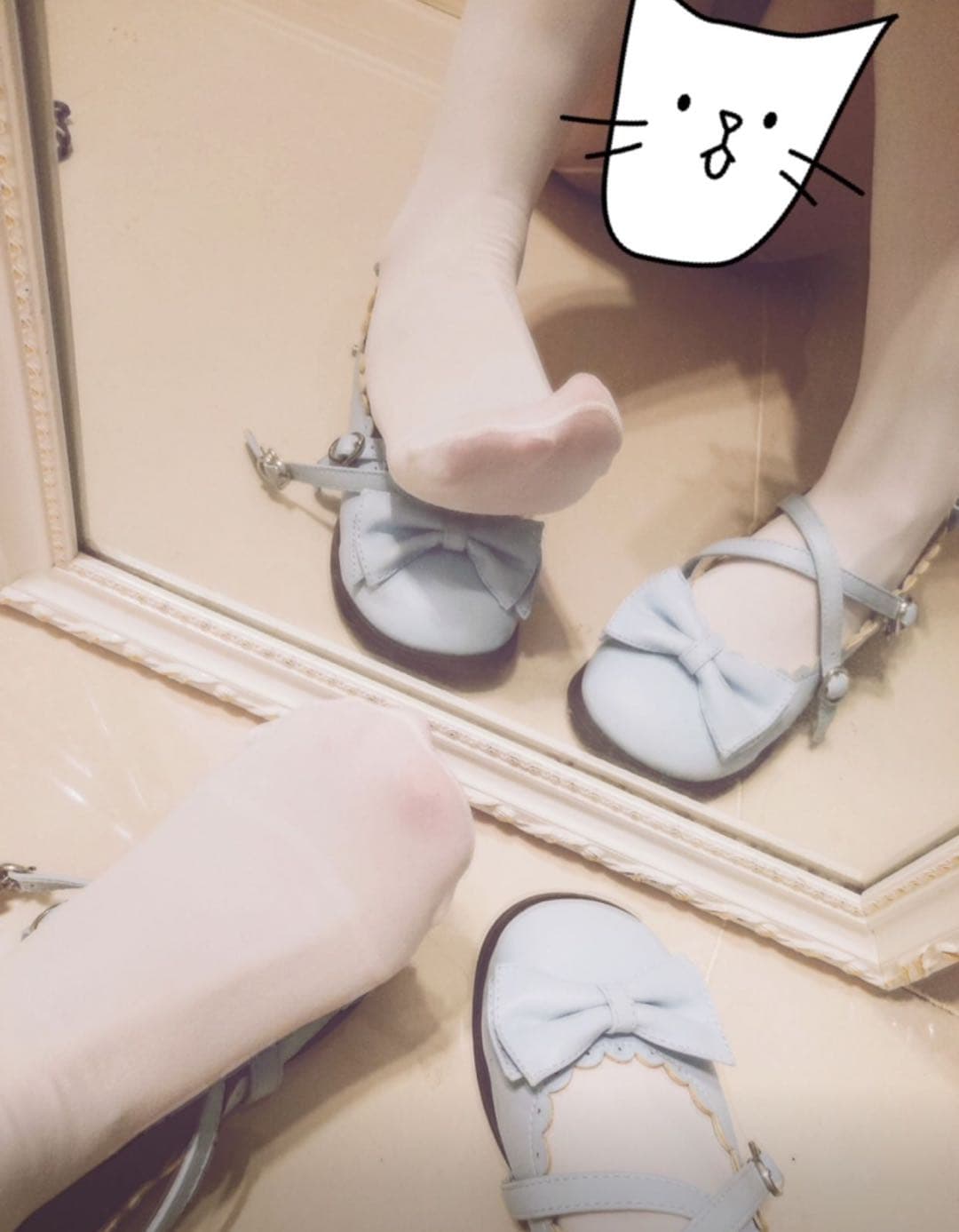 Stockings half-pulled down around ankles, bare toes showing and cotton socks strewn nearby in soft light