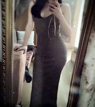 Luxurious indoor scene with feet slipping from silk stockings, cotton socks and polished floors creating soft reflections.