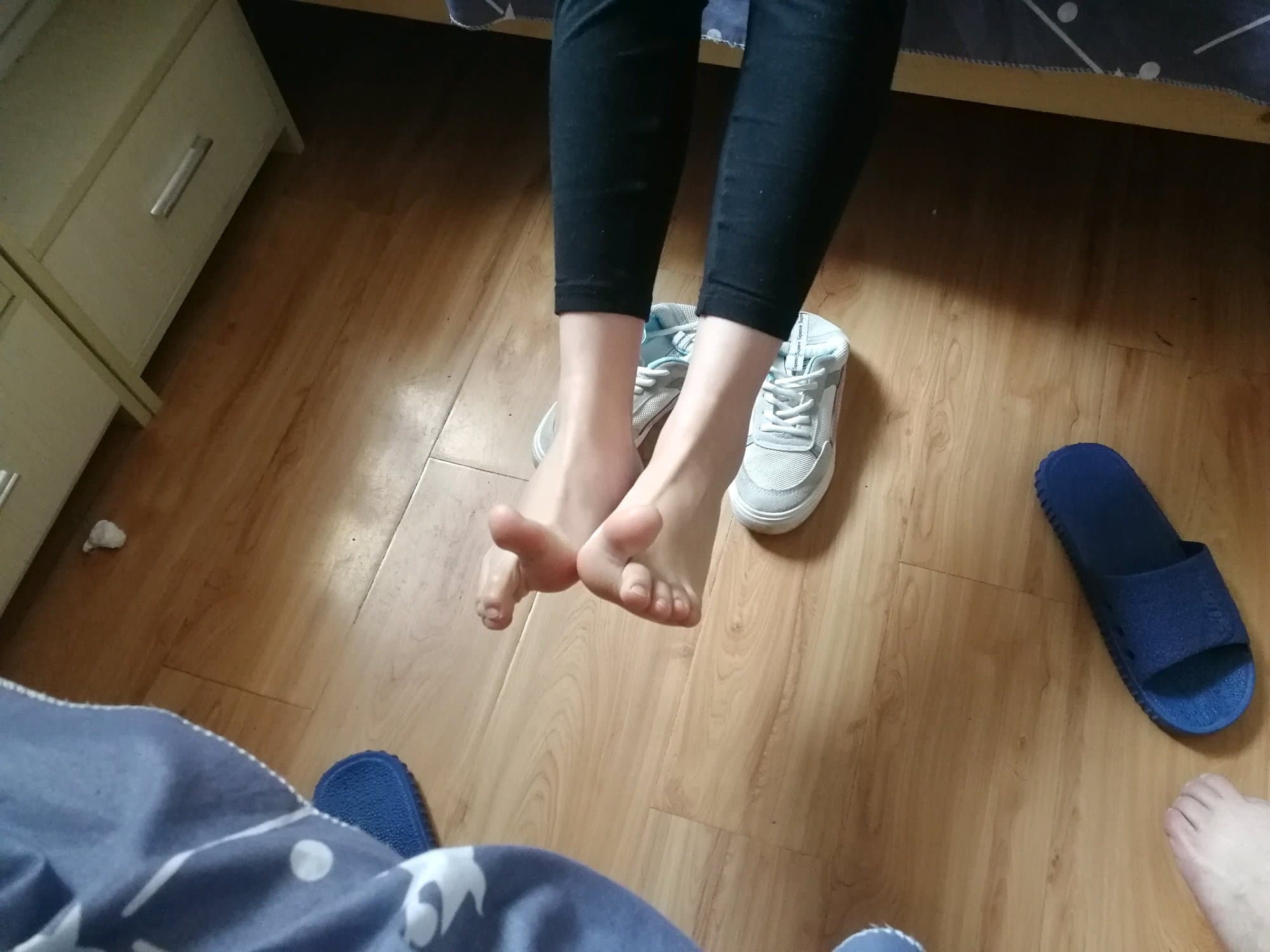 Close-up of gently worn cotton socks with soft texture and slight creasing around the toes