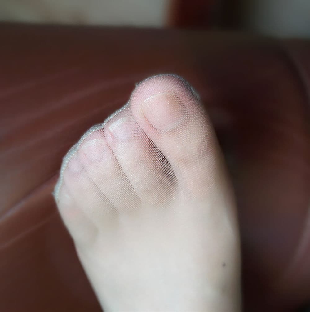 Jade-toned bare feet closeup