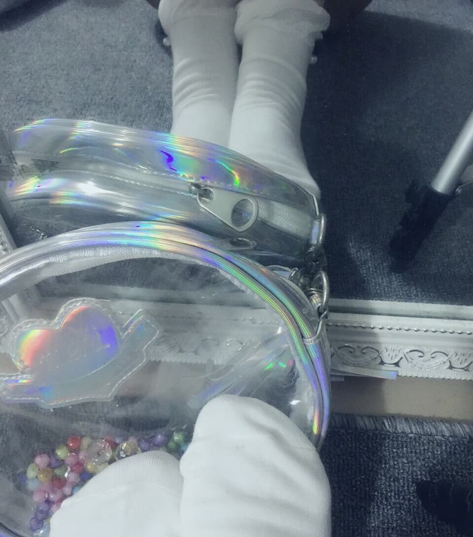 Ankle shot with delicate lace trim against smooth skin, sheer stocking edge visible above the heel