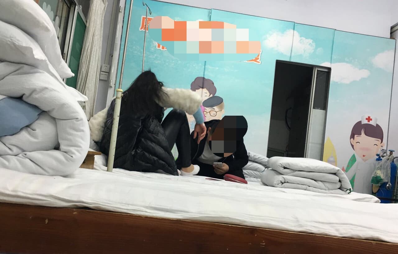 Bare toes on white sheets