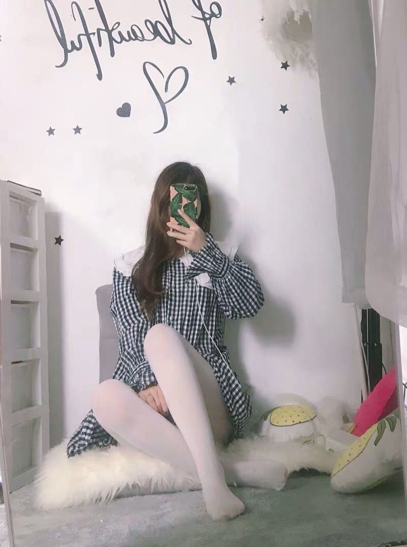 Sunlit bare toes wiggling in a relaxed pose, casting soft shadows on tiled floor