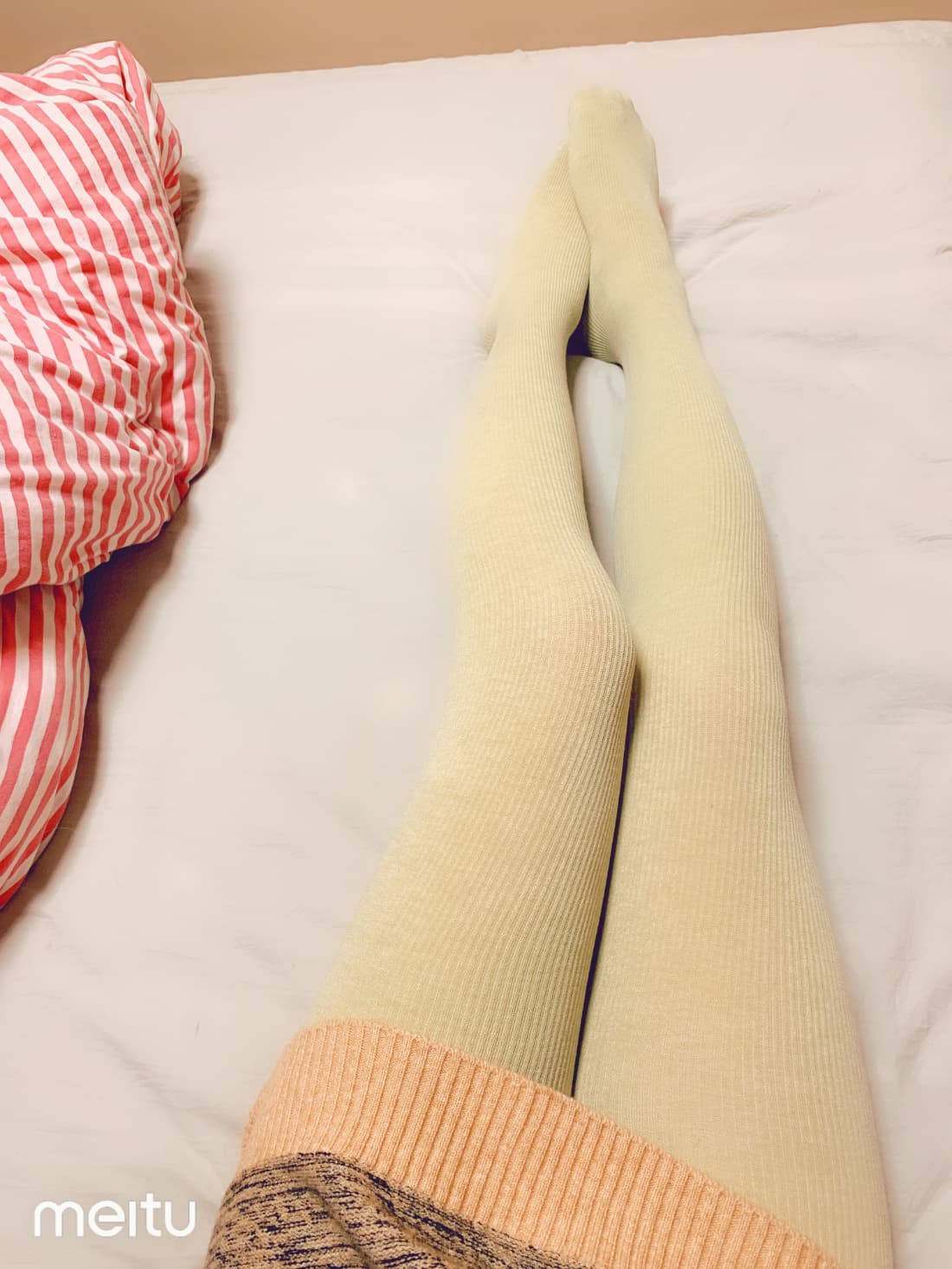 Sunlit ankle in sheer stockings, striped shadows highlighting the smooth curve of the arch