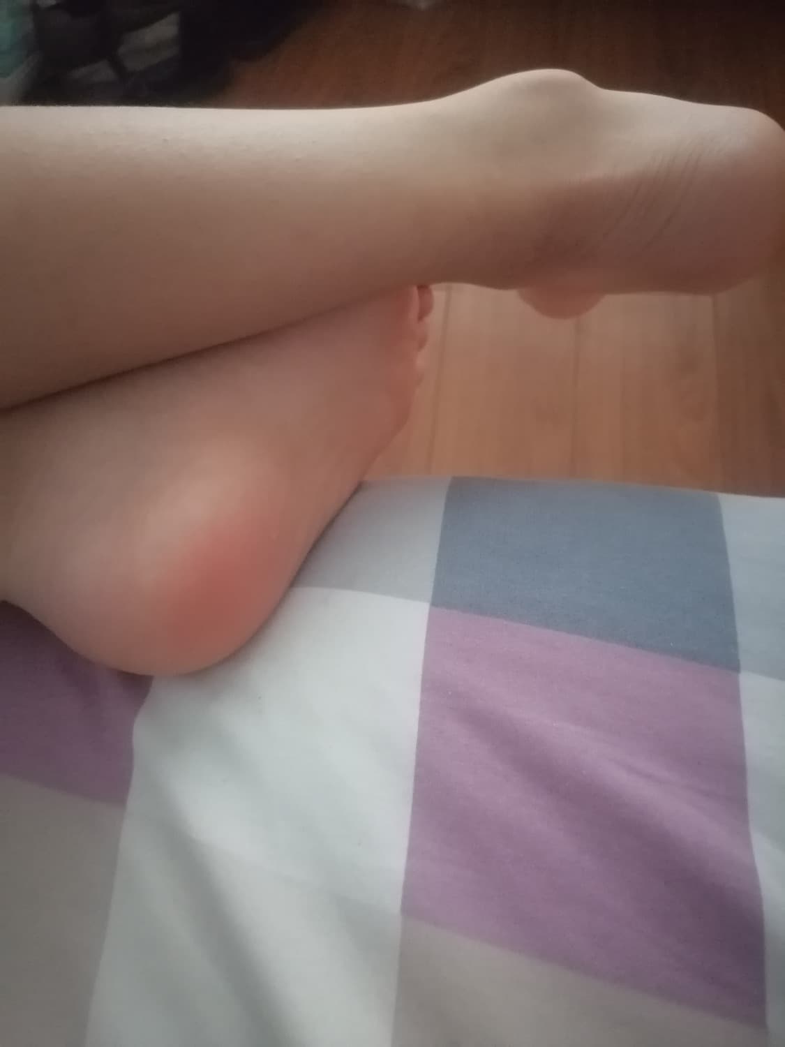 Close-up of arch and glossy nylon toe tips