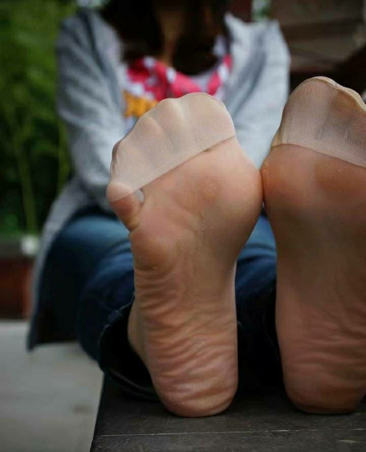 Bare feet in sheer toes