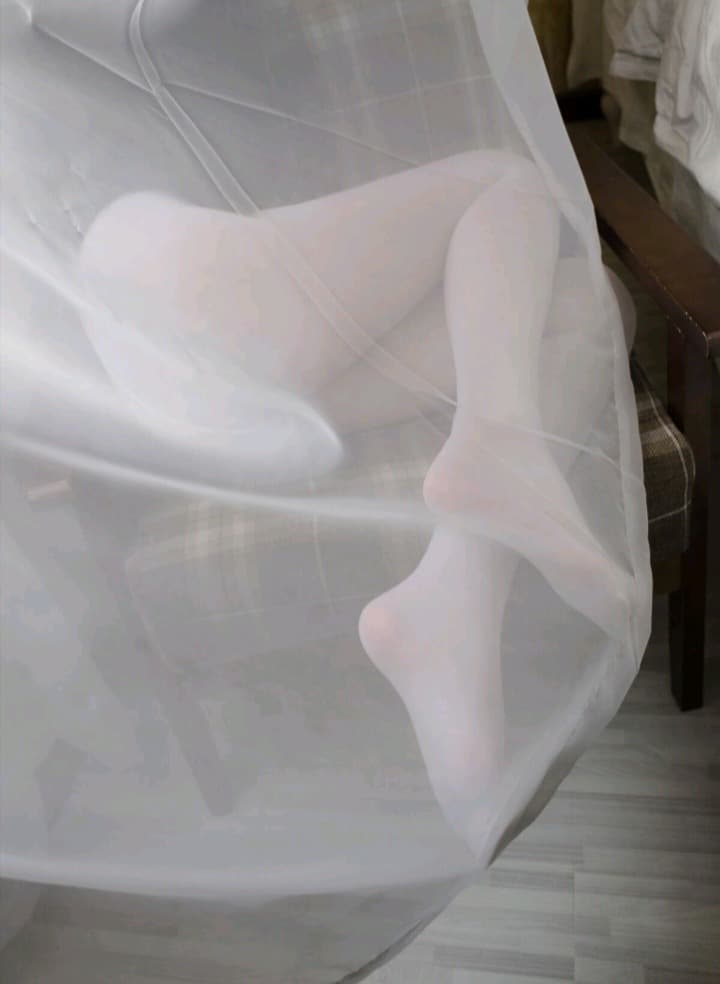 Bare soles in sheer nylon