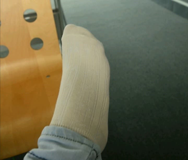 laced socks and pale toes