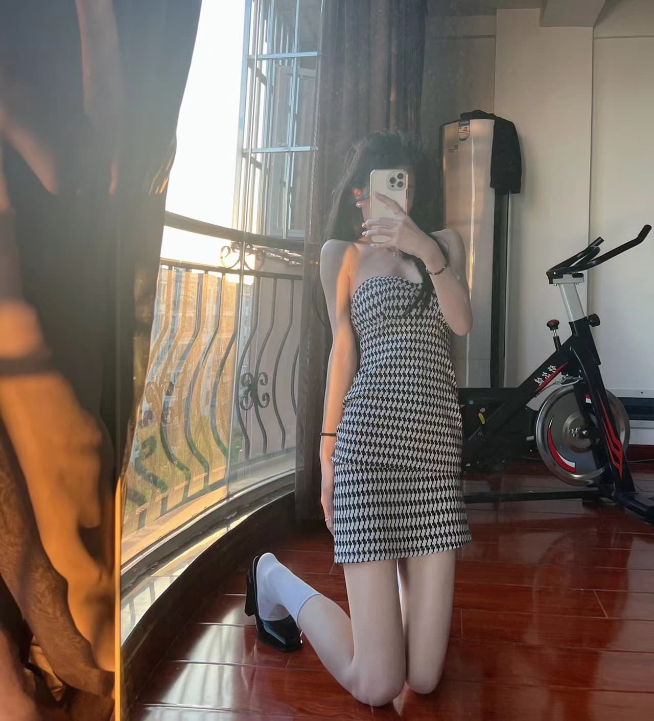 Asian feet in sheer nylon stockings, light glinting on the glossy fabric and skin