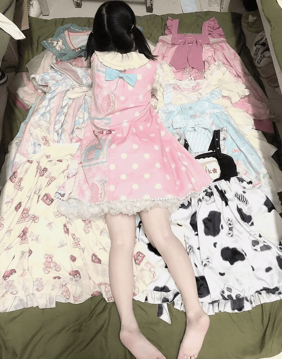 Frilly Lolita-style adult model sitting with bare feet and slightly wrinkled stockings, toes softly curled and highlighted by soft natural light